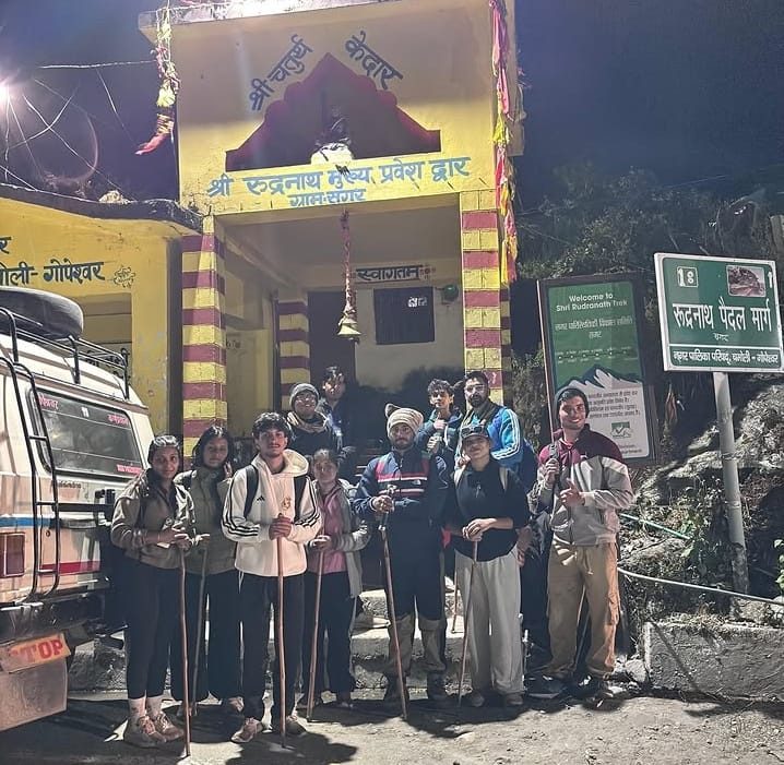 Group at the Rudranath entry gate at night