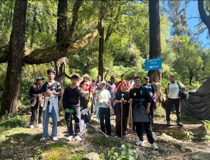 Group resting on a forest trail