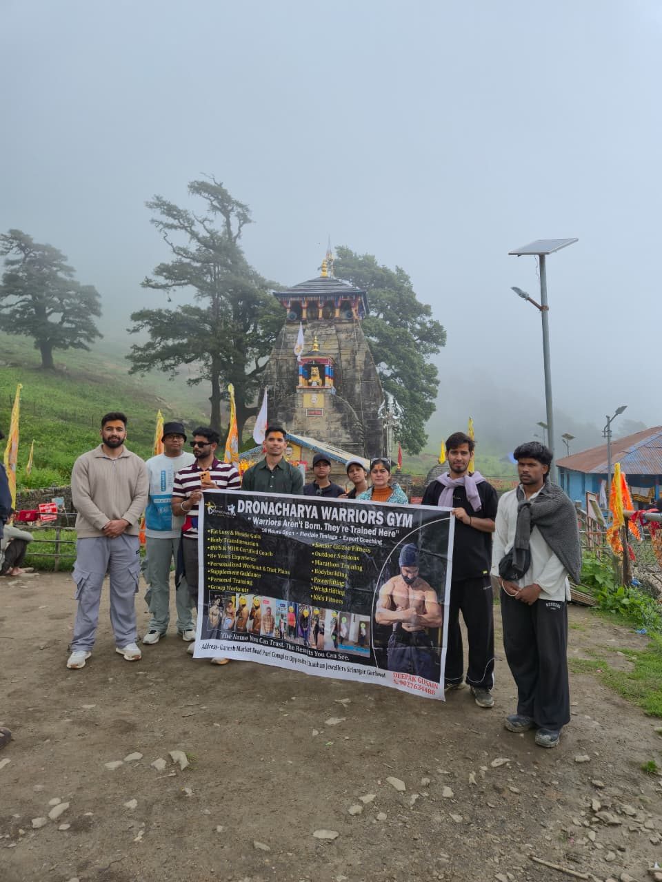 Group at the foggy Madhyamaheshwar temple